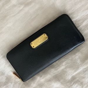 Lightly used black Marc by Marc Jacob’s Q Slim Zip Around Wallet.